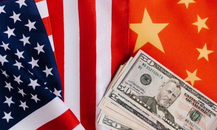 China will not accept sanctions on Russia says, Guo Shuqing