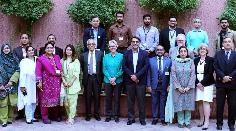 Group photo of Aga Khan University’s CIME faculty and officials celebrating MRCP(UK) PACES exam site accreditation.