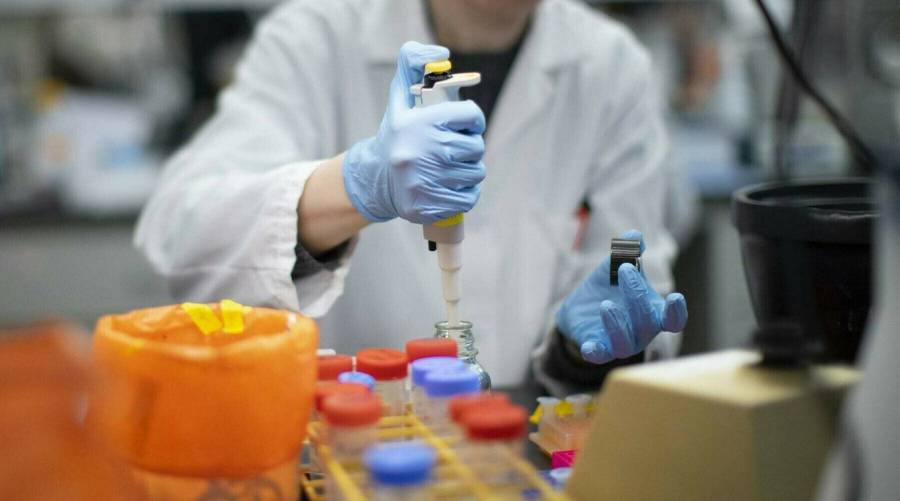 Scientists at NIH Pakistan analyzing sewage samples for poliovirus detection amid rising concerns over polio outbreaks.