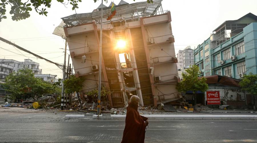 Collapsed buildings and rubble in Myanmar following the massive earthquake, highlighting urgent humanitarian needs.