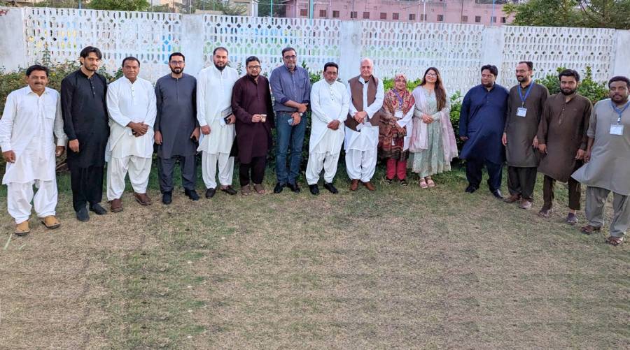 Group of healthcare executives at PHCT Hospital's Eid Milan event in Karachi.