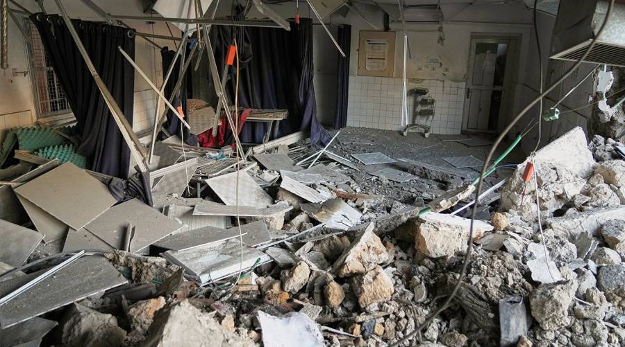 Demolished Al-Ahli Arab Baptist Hospital in Gaza after Israeli airstrike, showing rubble and destroyed medical infrastructure