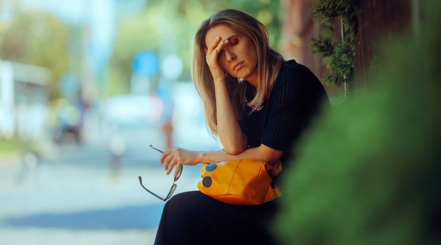 Young person feeling distressed during extreme heat in Australia