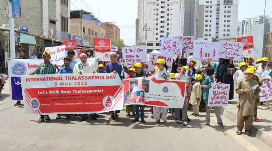 Children holding banners during thalassemia awareness rally by Kashif Iqbal Center in Karachi