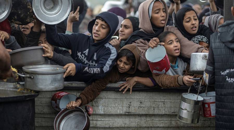 Malnourished child in Gaza receives medical attention as WHO warns of rising hunger-related deaths.