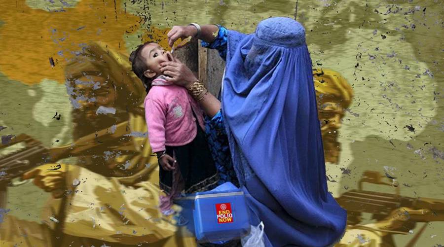 Health worker gives polio drops to a child in Pakistan during vaccination drive