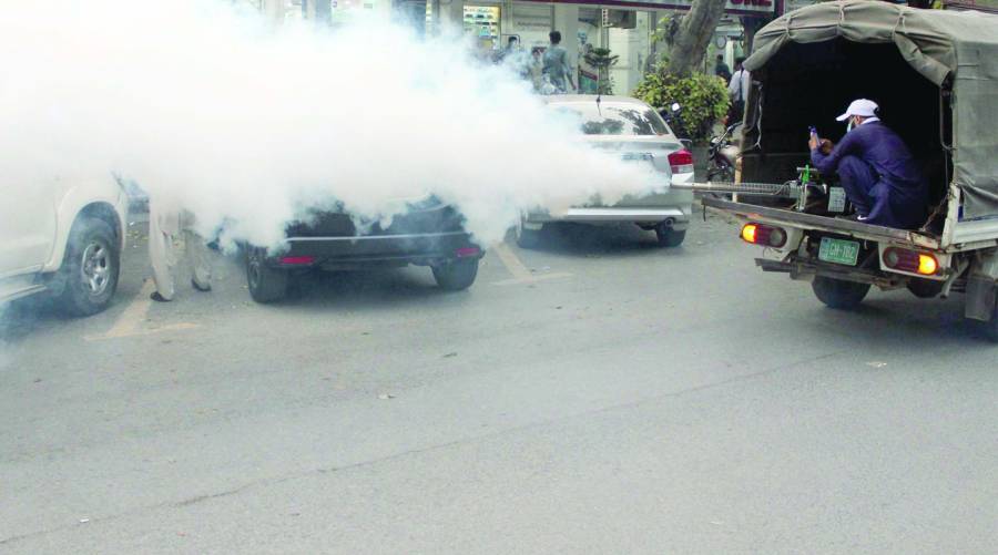 Anti-dengue spraying operation halted in Karachi due to unpaid workers and staff shortages.