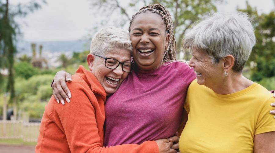 Older woman walking outdoors for better heart health