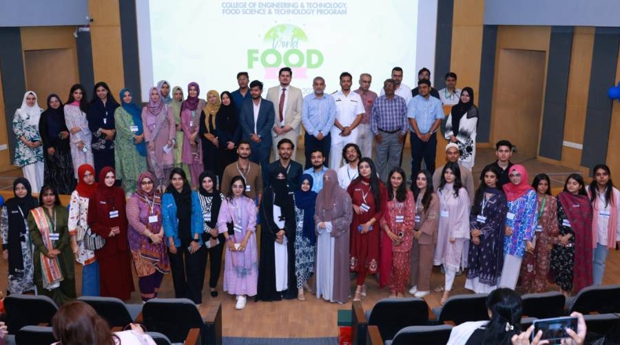 Group photo of participants and experts at Ziauddin University during the world food day 2025 event focused on food security and sustainable innovation.