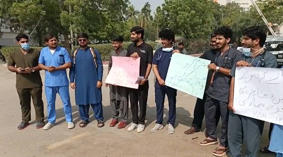 Young doctors protest salary delays at JPMC Karachi demanding pending payments.