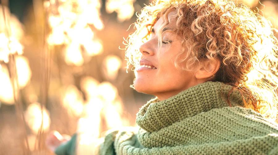 Vitamin D supplements, sunlight exposure, and healthy foods promoting longevity and overall health.