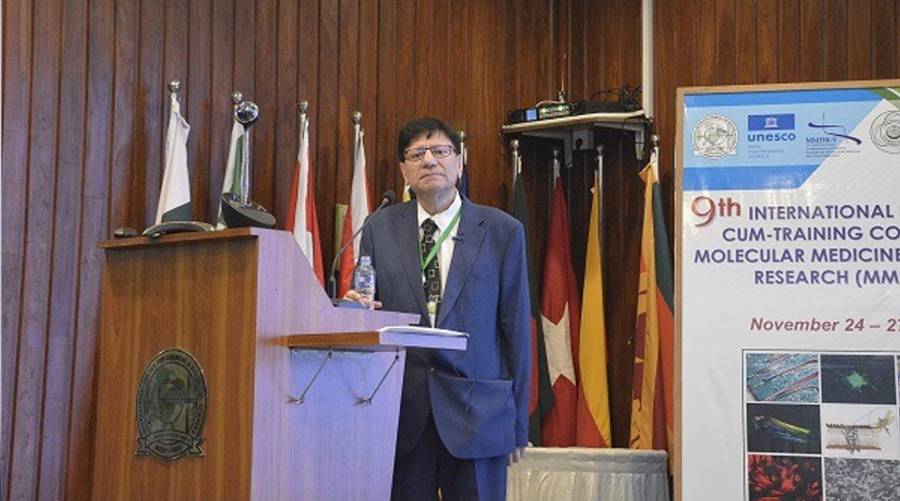 Prof Dr Nessar Ahmed from UK delivers his lecture at the 9th International Symposium-cum-Training Course on Molecular Medicine and Drug Research held at the Dr Panjwani Center for Molecular Medicine and Drug Research (PCMD), University of Karachi.