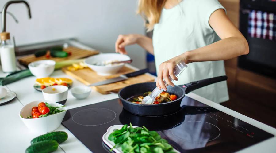 A bowl of traditional fermented vegetables commonly used in Asian kitchens, showcased as an accessible, probiotic-rich superfood known to improve blood sugar, triglycerides, blood pressure, and gut microbiome health.