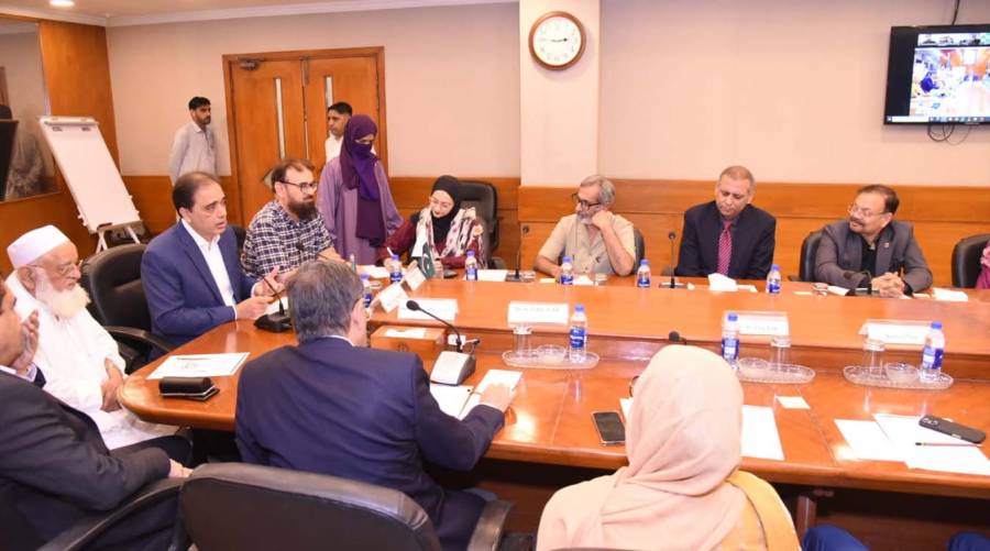 Karachi rabies control consultation at The Indus Hospital discussing dog bite crisis and mass dog vaccination strategy