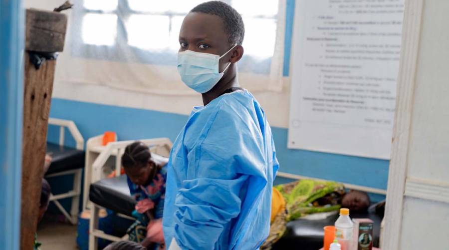 Healthcare workers in protective equipment responding to the Ebola outbreak declared a global health emergency by WHO in Congo and Uganda.