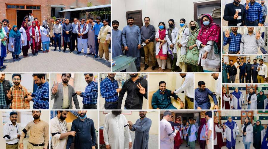 Healthcare workers wearing black armbands during a protest in a public hospital in Sindh to demand higher salaries, allowances, and service reforms.