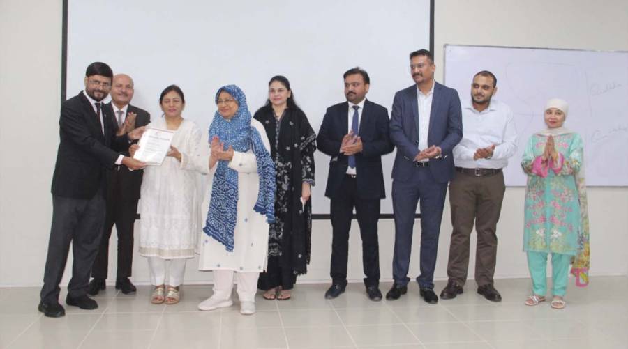 SHCC CEO Dr Ahson Qavi Siddiqi presents the Regular Licence to Prof Dr Jahan Ara Hasan of Dow University Hospital in the presence of Vice Chancellor Prof Dr Nazli Hossain and senior officials during the award ceremony in Karachi.