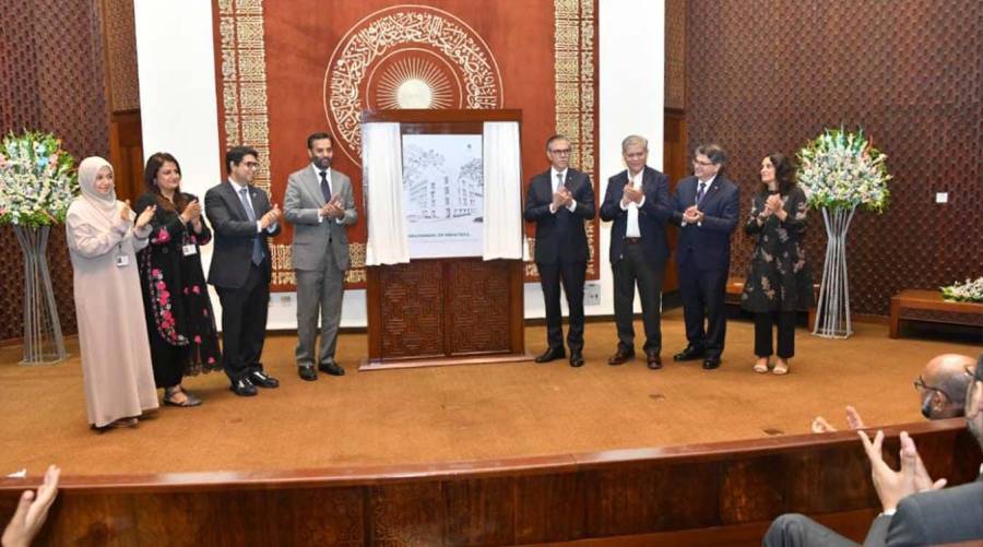 Federal Minister Syed Mustafa Kamal attends the launch of Aga Khan University's free pediatrics manual in Karachi.