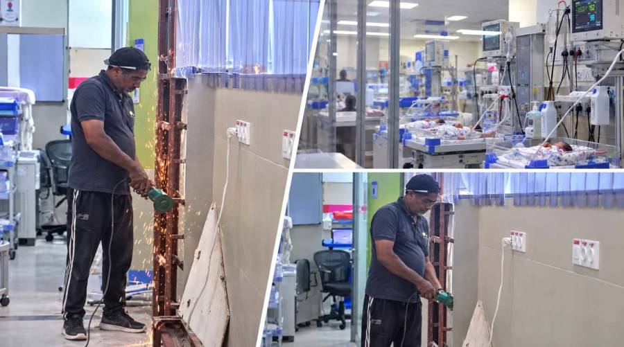 Machine producing sparks during repair work inside NICH nursery near newborns in Karachi