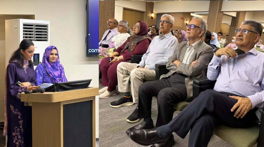 Dr Muneeba Ahsan Sayeed and Dr Fizza Farooqui brief participants on the newly launched “Bug & Drug” application, as DUHS Vice Chancellor Professor Nazli Hossain, Professor Muhammad Saeed Quraishy and other guests look on.